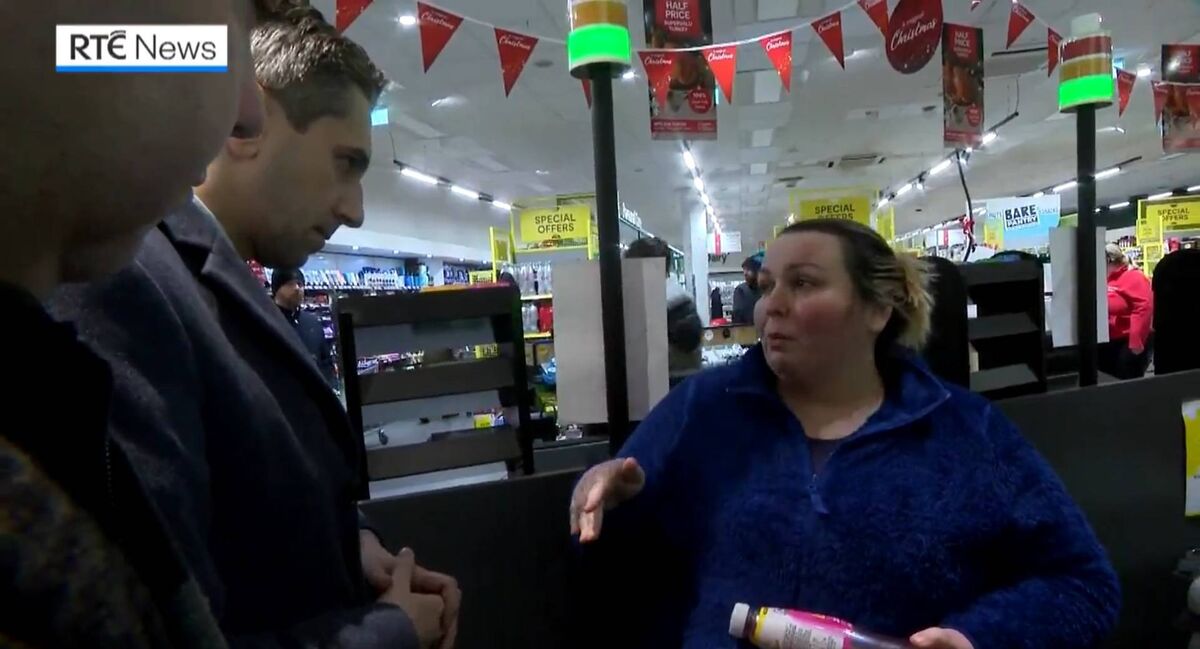 A still from the video clip of Taoiseach and Fine Gael leader Simon Harris meeting disability worker Charlotte Fallon in Kanturk, Co Cork, on Friday night. Picture: RTÉ News 