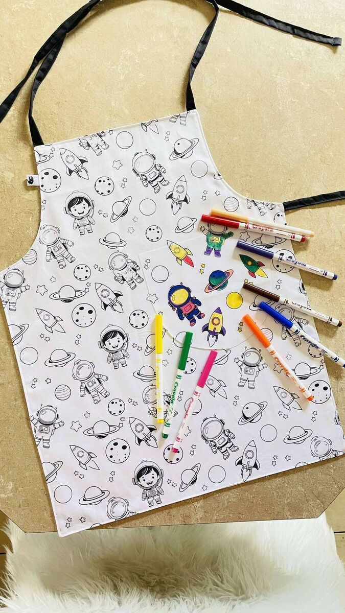 An apron from Little Fingerprint Boutique, which kids can colour in themselves. An apron from Little Fingerprint Boutique, which kids can colour in themselves.