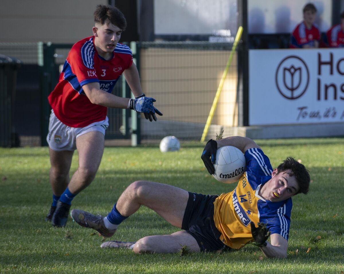  Denis O'Mullane De La Salle Macroom under pressure from ISK David Butler in the Corn Uí Mhuirí, Intermediate School Killorglin v De Le Salle College Macroom in Killarney on Wednesday.