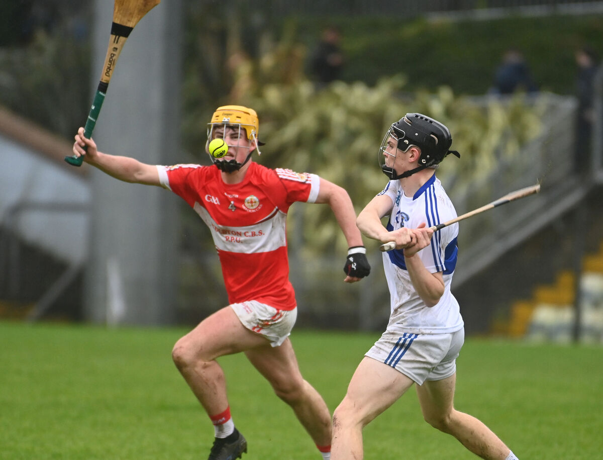 Gaelcholáiste Mhuire's Craig Ó Súilleabháin clears from Midleton CBS's Rian O'Connell. Picture: Eddie O'Hare