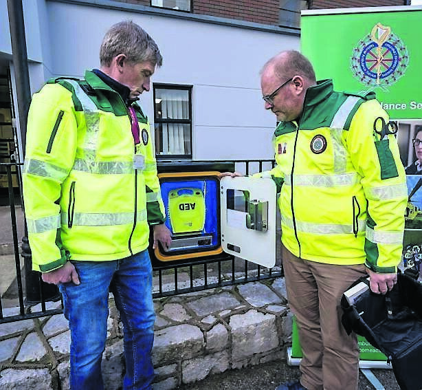 Community First Responders Craig Flanagan and Iain Grant demonstrate the new defibrillator which has been installed outside Midleton garda station, on Oliver Plunkett Place Picture Chani Anderson Community First Responders Craig Flanagan and Iain Grant demonstrate the new defibrillator which has been installed outside Midleton garda station, on Oliver Plunkett Place Picture Chani Anderson