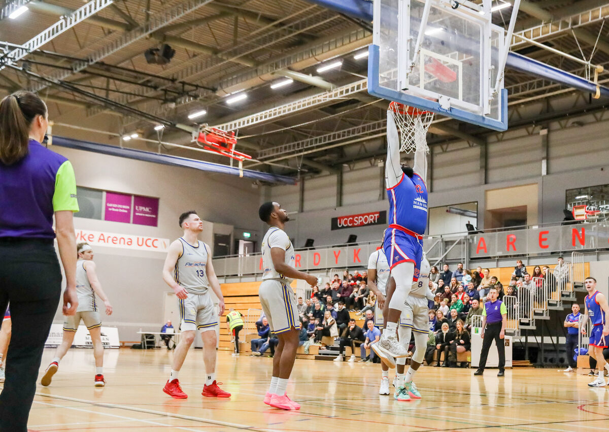 Demons's Elijah Tillman dunks the ball for the opening score. Picture: David Creedon Demons's Elijah Tillman dunks the ball for the opening score. Picture: David Creedon