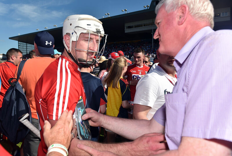 Cork's Patrick Horgan congratulated by county board chairman Ger Lane after defeating Waterford in the Munster SHC semi final at Semple stadium, Thurles