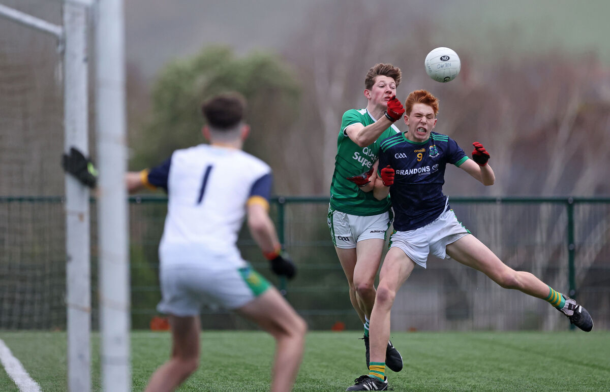  Eanna O Hurnai, Ballincollig, passes from Eoin Considine, Glanmire. Picture: Jim Coughlan.