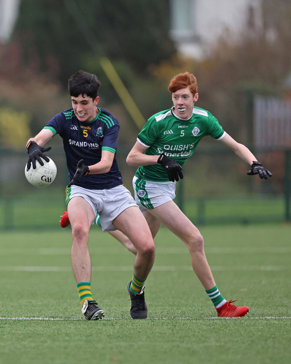  Eanna Lynch, Ballincollig, closes in on Faolan O'Sullivan, Glanmire. Picture: Jim Coughlan.