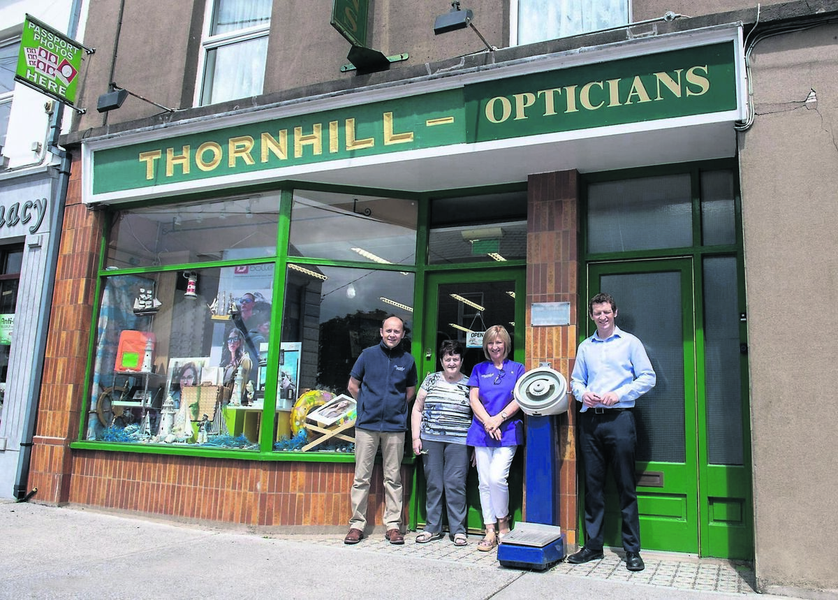 Tom and Cathy Thornhill, Lena Lane and Michael Hayes beside the Avery weighing scales outside the Thornhill chemist/opticians which has been in operation since 1924 in Kildorrery. Picture: Dan Linehan Tom and Cathy Thornhill, Lena Lane and Michael Hayes beside the Avery weighing scales outside the Thornhill chemist/opticians which has been in operation since 1924 in Kildorrery. Picture: Dan Linehan