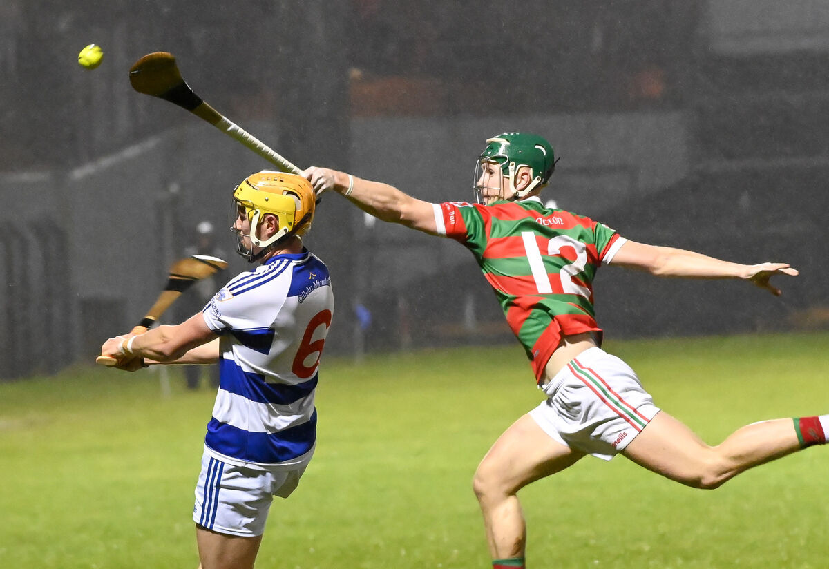 Killavullen's Liam Cronin clears his lines from Tracton's Paul O'Riordan. Picture: David Keane. Killavullen's Liam Cronin clears his lines from Tracton's Paul O'Riordan. Picture: David Keane.