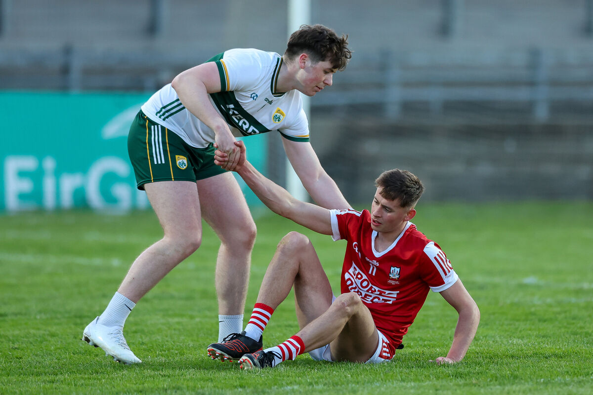 Kerry goalkeeper Michael Tansley gives Hugh O’Connor of Cork a hand up after the Munster U20 football final this year. Picture: INPHO/Natasha Barton