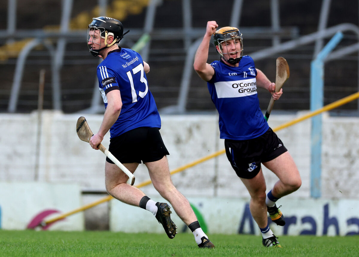 Sarsfields’ Jack O'Connor celebrates scoring his goal with Daniel Hogan. Picture: INPHO/James Crombie