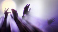 Abstract blurred hands in light