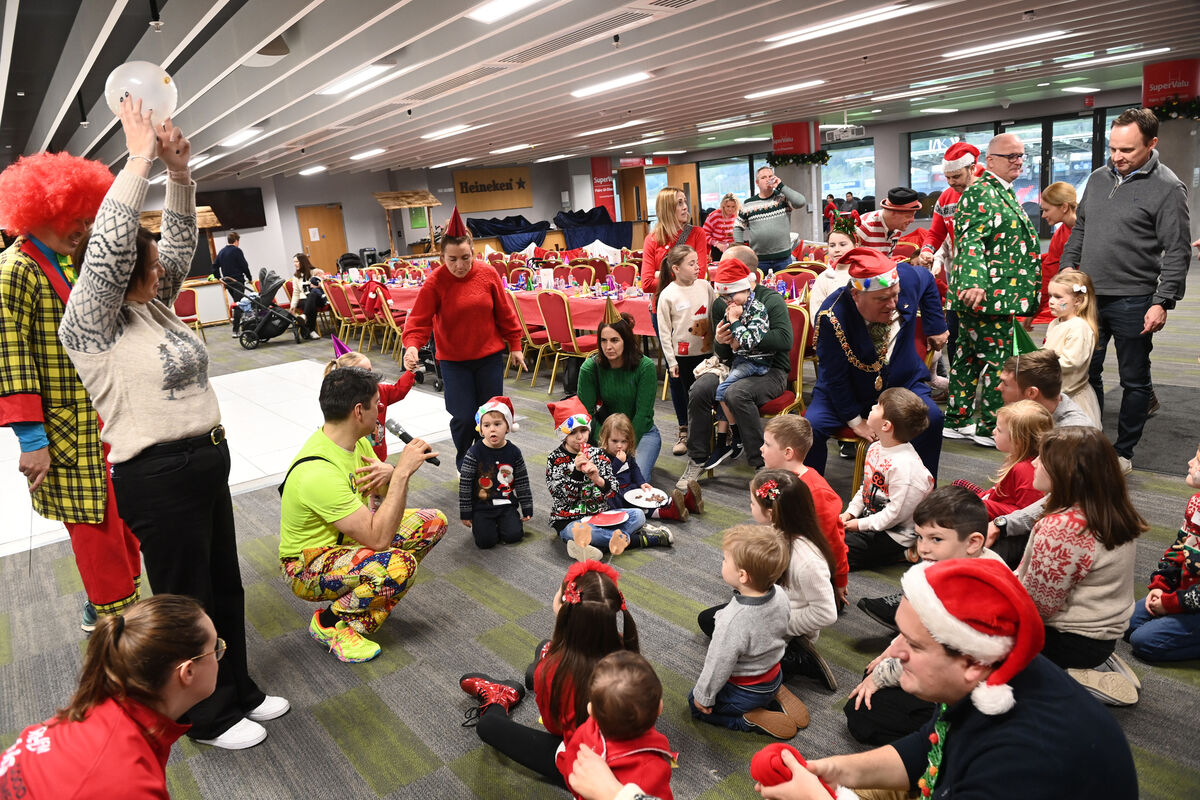 Families arrived in fire trucks, Garda cars, and minibuses, and enjoyed a Garda escort through Cork, as Cork City Hospitals Children’s Club brought 278 children to visit Mr and Ms Claus for two days of entertainment at SuperValu Páirc Uí Chaoimh this week.	Picture: Larry Cummins
                    