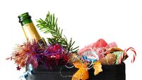 After christmas garbage dump food christmas tree branch empty bottle colorful tincel peel orange tangerine waste