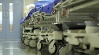 Hospital corridor with gurneys