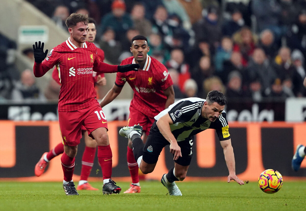 Liverpool's Alexis Mac Allister and Newcastle United's Fabian Schar (right) during the Premier League match at St James' Park, Newcastle. Picture d: Owen Humphreys/PA Wire.