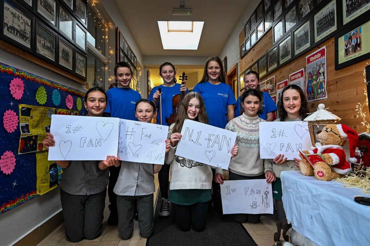 The Chocolate Swappers String Quartet members Conan Clery, Áine Lucey, Sophia Corkery, and Leila Foley with their fan club Sofia Cotter, Arya Landry, Eryn Keating, Anna-Rose Kelleher, and Emma Lonergan at Terelton National School, where their performance on tonight’s ‘Late Late Toy Show’ is causing great excitement. Picture Chani Anderson. The Chocolate Swappers String Quartet members Conan Clery, Áine Lucey, Sophia Corkery, and Leila Foley with their fan club Sofia Cotter, Arya Landry, Eryn Keating, Anna-Rose Kelleher, and Emma Lonergan at Terelton National School, where their performance on tonight’s ‘Late Late Toy Show’ is causing great excitement. Picture Chani Anderson.