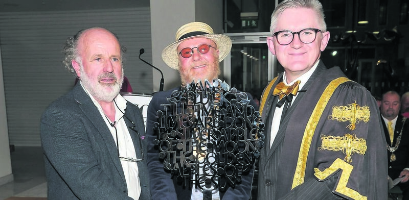 Richard T Cooke, centre, representing the Cork Adult Education Council, is presented with the Bertram Windle Award 2018 by artist Tom Little and professor Patrick O’Shea, president of UCC, at the UCC Adult Continuing Education Autumn conferring ceremony, at the Atrium in City Hall, Cork.	Picture: David Keane
                    