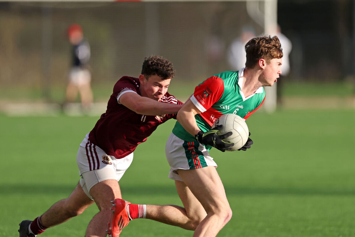 Mark O'Brien, Ballinora, is pursued by Patrick Casey, Bishopstown. Picture: Jim Coughlan.  Mark O'Brien, Ballinora, is pursued by Patrick Casey, Bishopstown. Picture: Jim Coughlan.