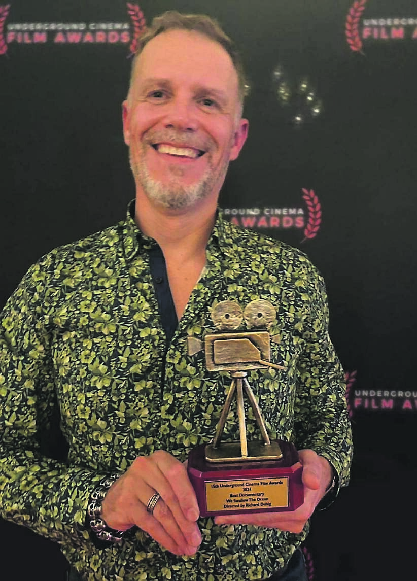 Podcaster Ricard Duhig with his award for the metal film We Swallow The Ocean, at the Underground Cinema Awards in Dublin last month