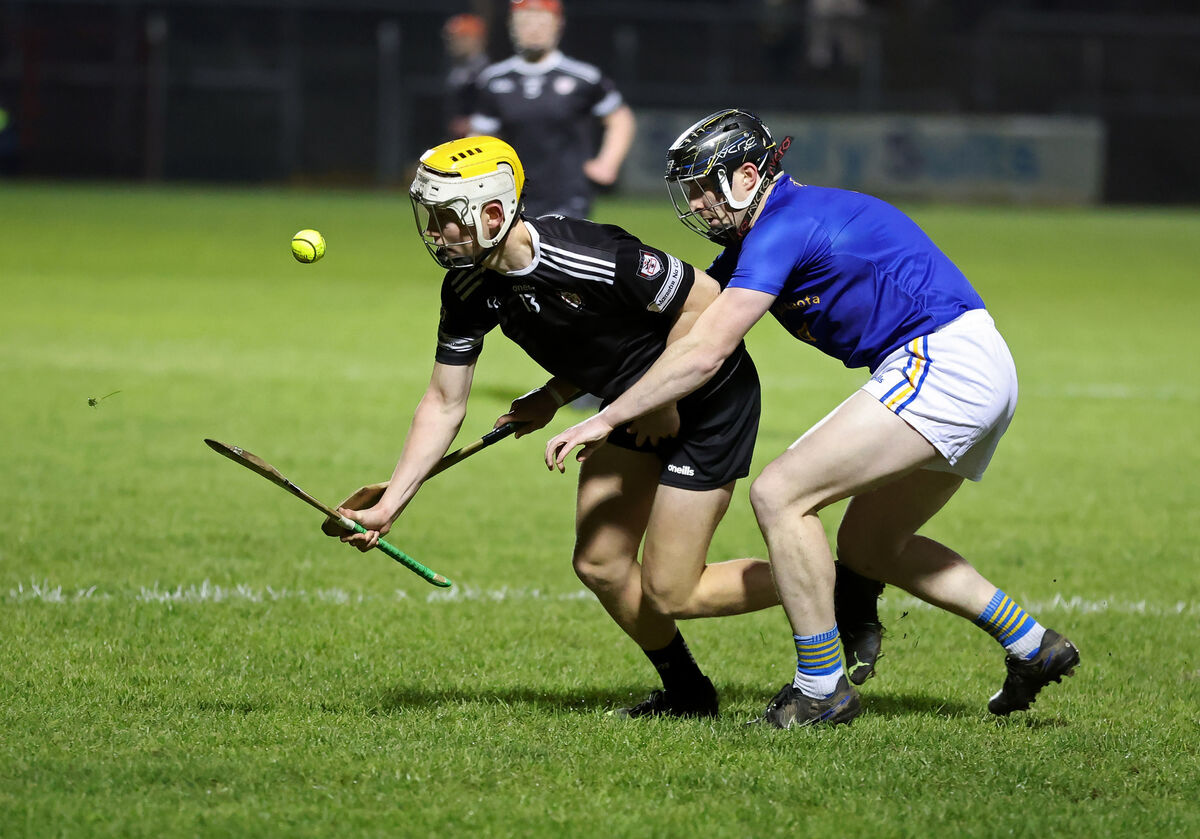 Shane Kennedy, St Finbarr's, battling Peter Barrett, Midleton, who late goal decided the U21 hurling final at Páirc Uí Rinn. Picture: Jim Coughlan.