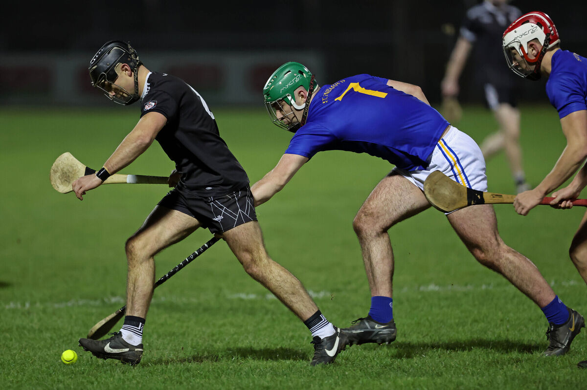  Adam Buckley and Aidan Barry, St Finbarr's, tackle Mikey Finn, Midleton. Picture: Jim Coughlan.