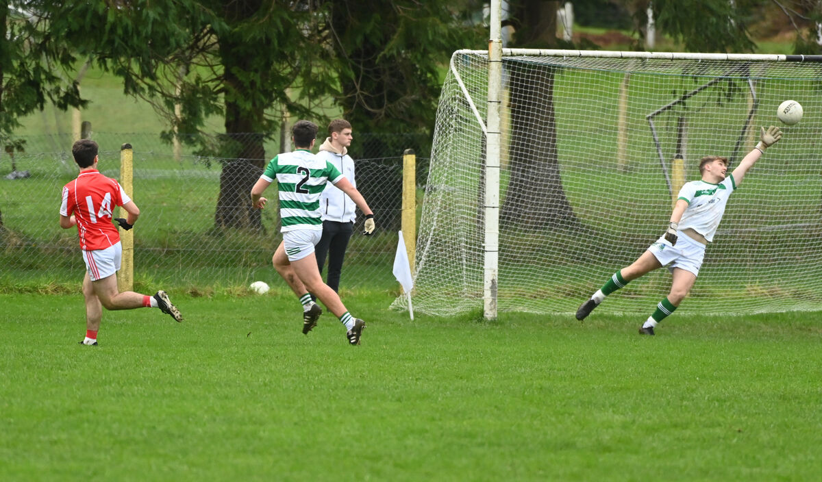 Beara's Tom O'Connor scores a goal past Valley Rovers goalkeeper Josh Woods. Picture: Eddie O'Hare