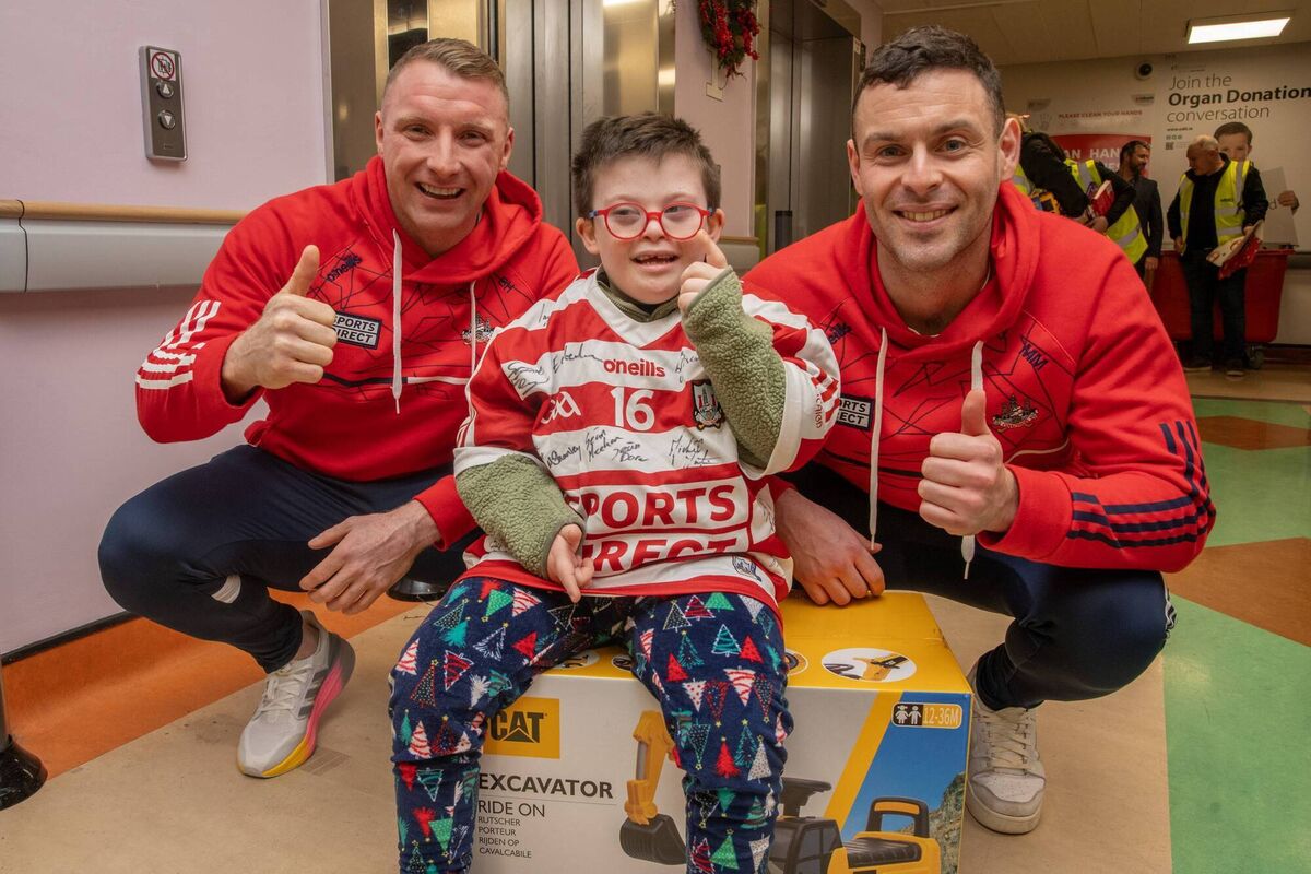 Santa arrived by Coast Guard helicopter to Cork University Hospital to deliver presents to child patients. The annual toy drop, now in its fifth year, is a partnership between Kinsale & District Lions Club and CUH Charity, the hospital’s fundraising arm. Pictured (L/R): Brian Hurley, Harry Bassel (7) and Micheál Aodh Martin, Picture: Colm Lougheed. Santa arrived by Coast Guard helicopter to Cork University Hospital to deliver presents to child patients. The annual toy drop, now in its fifth year, is a partnership between Kinsale & District Lions Club and CUH Charity, the hospital’s fundraising arm. Pictured (L/R): Brian Hurley, Harry Bassel (7) and Micheál Aodh Martin, Picture: Colm Lougheed.
