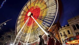 <p>Why not buy tickets for someone to ride the Ferris wheel on Grand Parade (above)? Or gift a loved one a voucher to a Cork restaurant or café, like Myo Café (right) on Pope’s Quay</p>