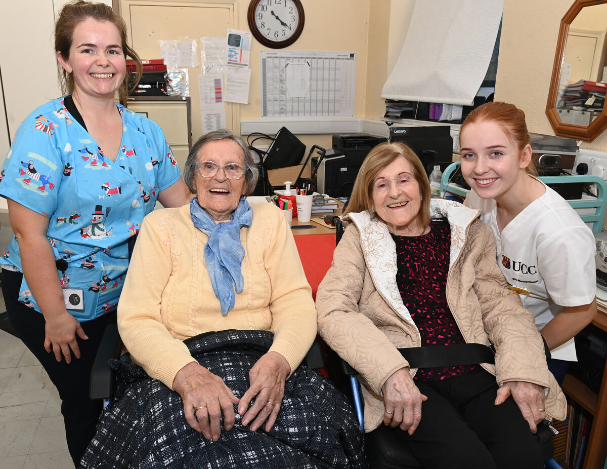  Laura Geary, activities coordinator and student nurse Anna Kearney with Chrissie Murphy who recently celebrated her 97th birthday, and Rita Carroll enjoying the festive fun at St Finbarr's Hospital. Picture: Larry Cummins