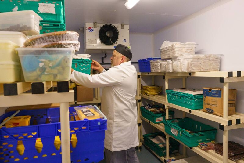 A volunteer using the new cold room facilities in Croí na Laoí, part of Cork Penny Dinners' new facilities on James Street