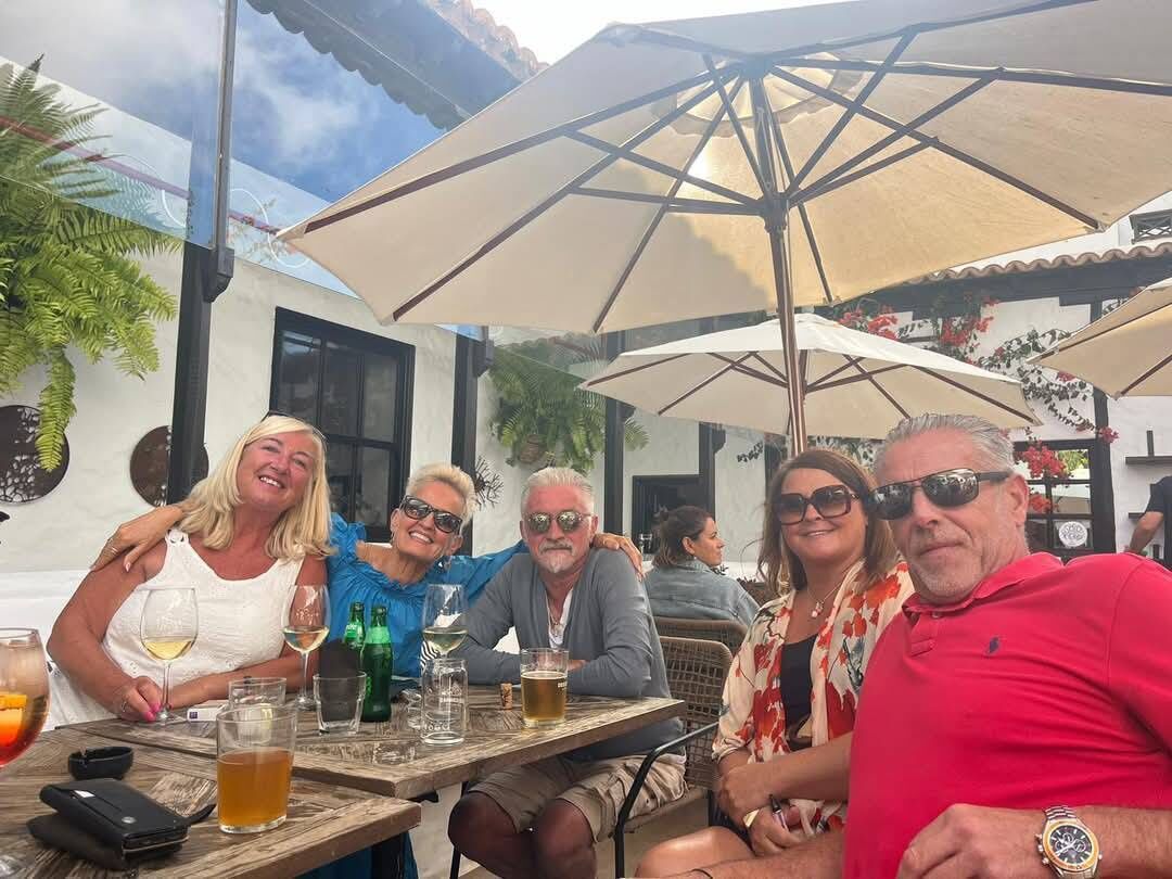 Janet and Chris with their friends. From left: Carol, Janet, Chris, Anna and John. Janet and Chris with their friends. From left: Carol, Janet, Chris, Anna and John.