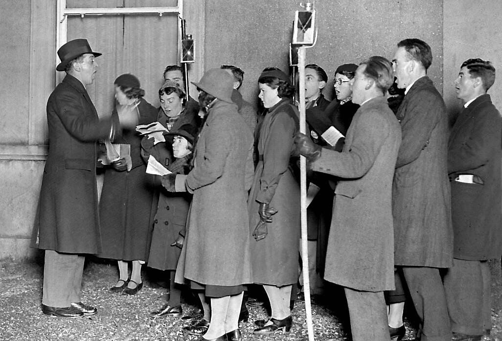 Carol singers collecting in aid of Penny Dinners. Carol singers collecting in aid of Penny Dinners.