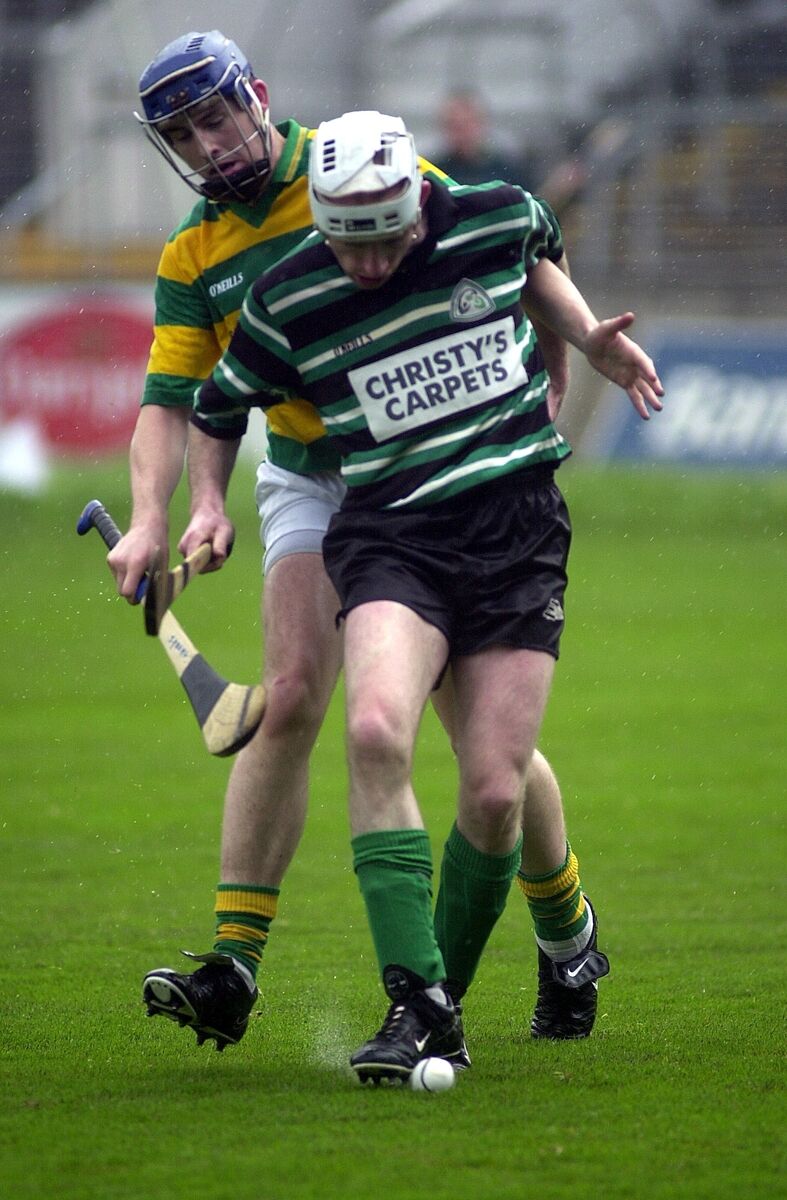 Douglas's Dave McSweeney and Blackrock's Joe Young in action in 2002. Picture: Gavin Browne