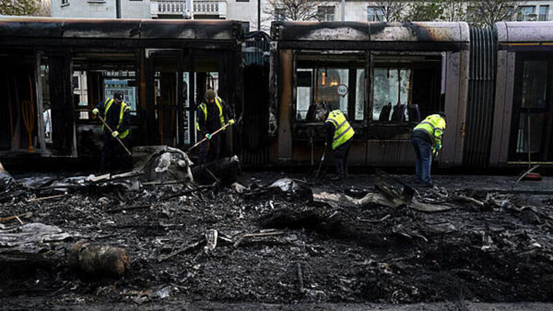 Man (62) accused of setting a Luas on fire during Dublin riots appears in court Man (62) accused of setting a Luas on fire during Dublin riots appears in court