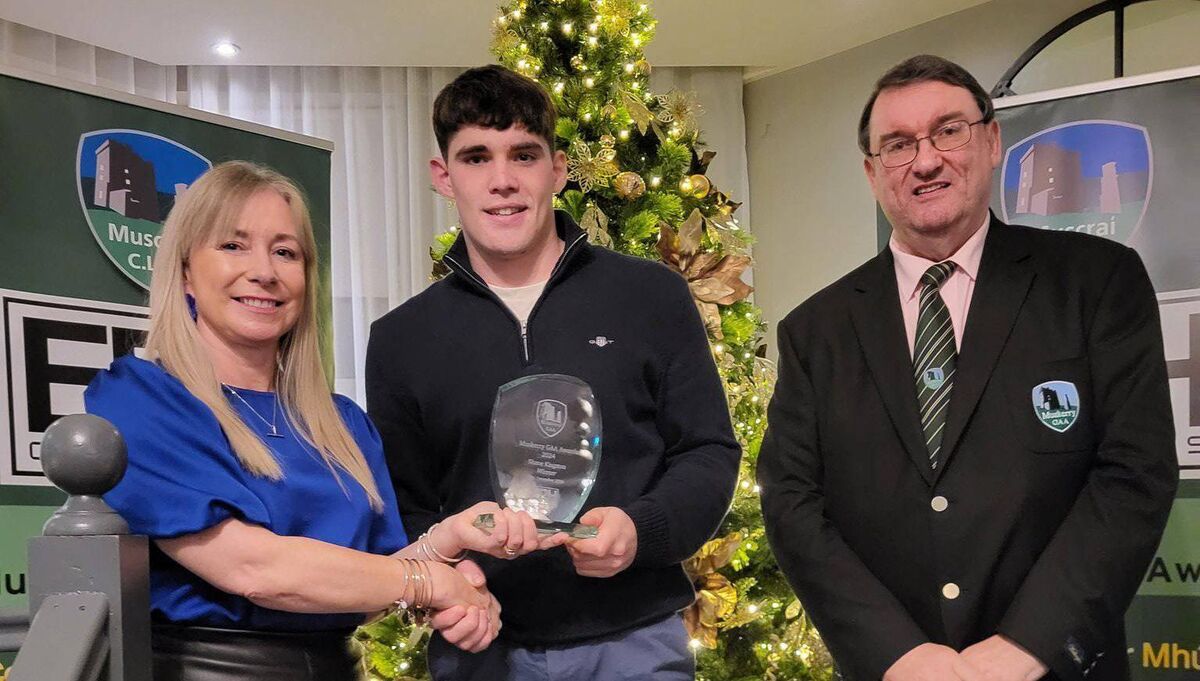 Marie Casey of EPH Controls, Shane Kingston and John Feeney, Muskerry GAA chairman. Picture: Anne O'Riordan