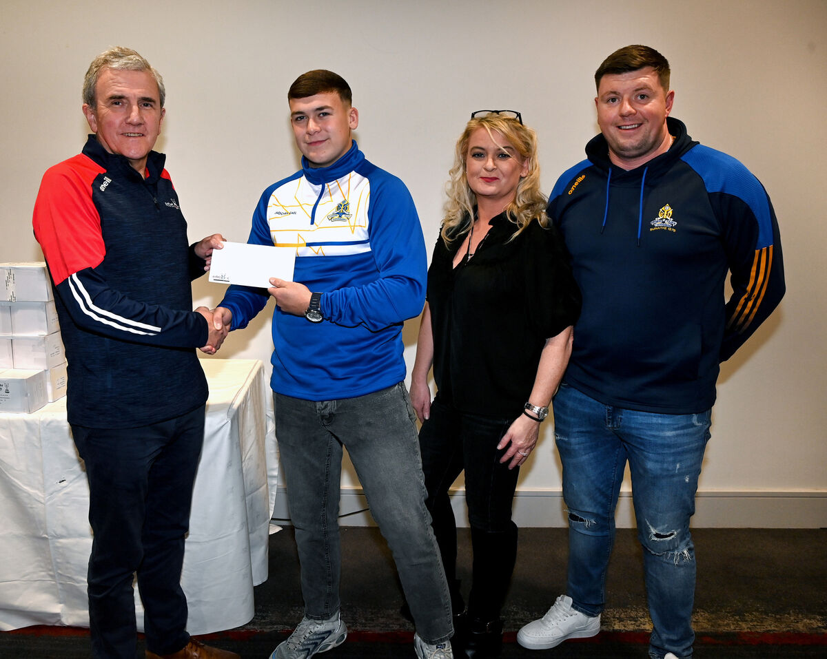 Michael O'Mahony, chairman Rebel Óg, makes a special presentation to David Akar, St Finbarr's to mark his national bravery award. Also included are his mother Pamela Cregan and Barry O'Connor, St Finbarr's U15 manager. Picture: Eddie O'Hare Michael O'Mahony, chairman Rebel Óg, makes a special presentation to David Akar, St Finbarr's to mark his national bravery award. Also included are his mother Pamela Cregan and Barry O'Connor, St Finbarr's U15 manager. Picture: Eddie O'Hare
