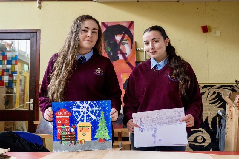 Sophie Power and Zahira O’Flynn with some of the original artwork they created for this year's Holly Bough. Picture Chani Anderson Sophie Power and Zahira O’Flynn with some of the original artwork they created for this year's Holly Bough. Picture Chani Anderson