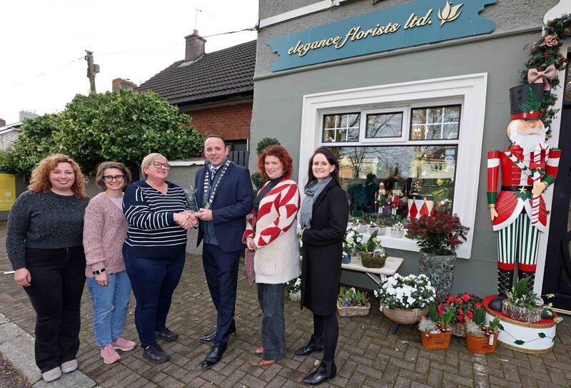 Elvyra Donovan, Magda Wazia and Zorica O’Brien, Elegance Florists Ltd, Douglas Rd, receiving the Best Independent Window Display award from Aaron Mansworth, Lisa McCarthy, and Cliona Barnes. The judging panel felt the use of colours and props helped to provide a coherent theme and that it was a store full of personality for this Christmas season. Picture: Jim Coughlan. Elvyra Donovan, Magda Wazia and Zorica O’Brien, Elegance Florists Ltd, Douglas Rd, receiving the Best Independent Window Display award from Aaron Mansworth, Lisa McCarthy, and Cliona Barnes. The judging panel felt the use of colours and props helped to provide a coherent theme and that it was a store full of personality for this Christmas season. Picture: Jim Coughlan.