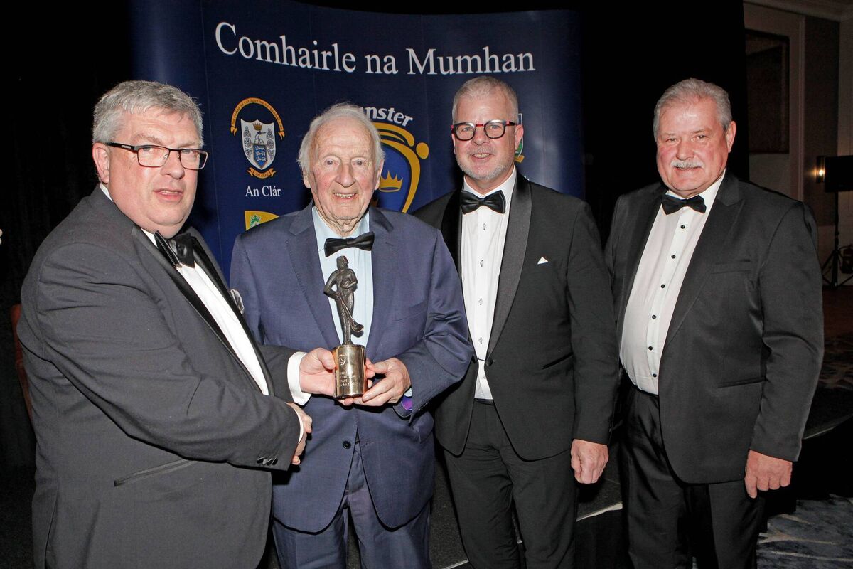 Denis Hurley (Sarsfields Club President) accepts the Club of the Year Award from Munster GAA Chairman Ger Ryan in the presence of Allan McNamara (Sarsfields) and Munster GAA Treasurer Bob Ryan at the 2024 Munster GAA Awards at Fota Island Resort on Saturday December 14th. Denis Hurley (Sarsfields Club President) accepts the Club of the Year Award from Munster GAA Chairman Ger Ryan in the presence of Allan McNamara (Sarsfields) and Munster GAA Treasurer Bob Ryan at the 2024 Munster GAA Awards at Fota Island Resort on Saturday December 14th.