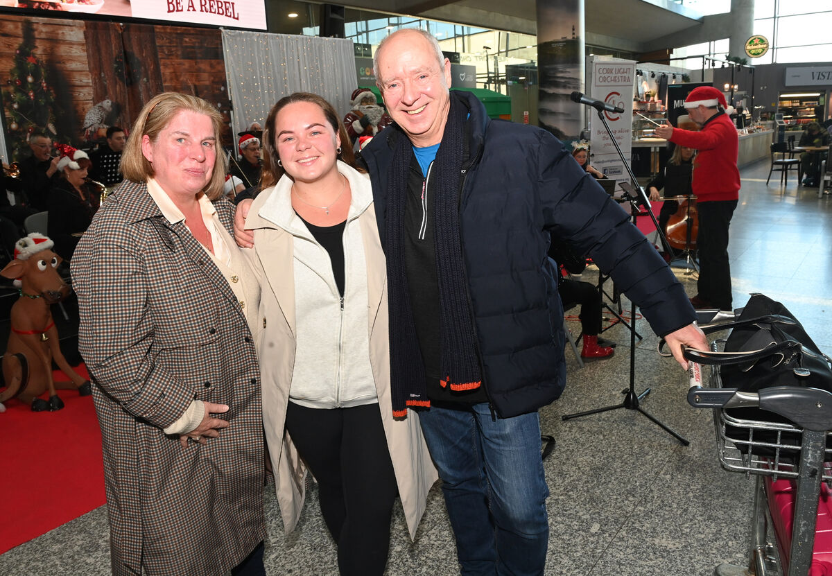 Stephanie Binks, Glanmire is welcomed home from Asia by her parents Pamela and Roger. Picture: Larry Cummins. Stephanie Binks, Glanmire is welcomed home from Asia by her parents Pamela and Roger. Picture: Larry Cummins.