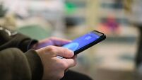 Child boy playing games on a smartphone,kids education technology,addiction