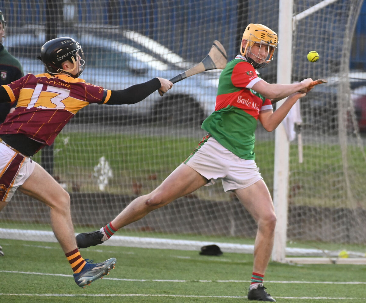 Ballinora's Billy Carbery clears from Youghal's Conor Galvin. Picture: Eddie O'Hare