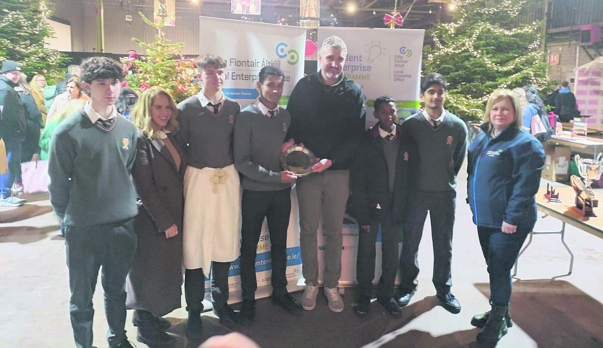 The five pupils from Coláiste an Spioraid Naoimh in Bishopstown, from left, Tom McKeown, Michael Sweeney, Ahroon Santhosh, Mamoun Mirghani and Abraham Kurian, with their award along with three people from the Student Enterprise programme The five pupils from Coláiste an Spioraid Naoimh in Bishopstown, from left, Tom McKeown, Michael Sweeney, Ahroon Santhosh, Mamoun Mirghani and Abraham Kurian, with their award along with three people from the Student Enterprise programme