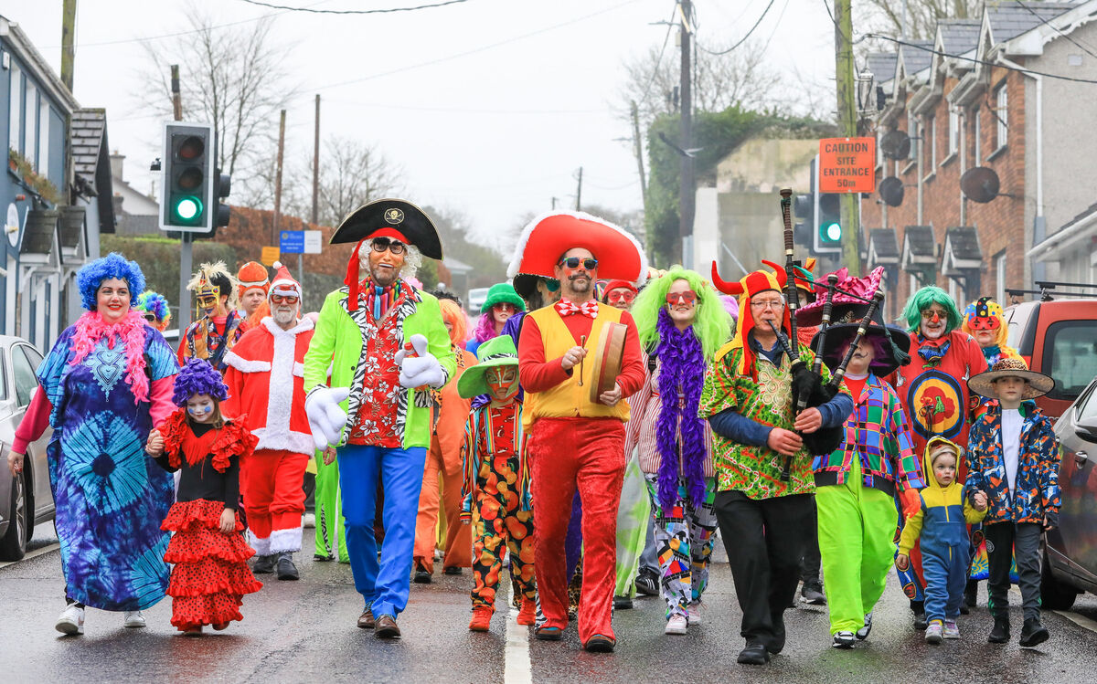 Wren Boys march down Main Street at the Wren Boys Street Festival that was held on St. Stephen's day in Carrigaline, Co. Cork. Wren Boys march down Main Street at the Wren Boys Street Festival that was held on St. Stephen's day in Carrigaline, Co. Cork.