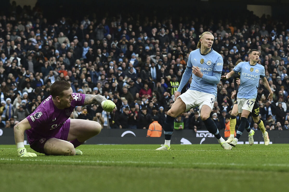 Manchester City's Erling Haaland, centre, reacts after failing to score a penalty kick against Everton's Jordan Pickford during their Premier League match at the Etihad stadium in Manchester on Thursday. Picture: AP Photo/Rui Vieira Manchester City's Erling Haaland, centre, reacts after failing to score a penalty kick against Everton's Jordan Pickford during their Premier League match at the Etihad stadium in Manchester on Thursday. Picture: AP Photo/Rui Vieira