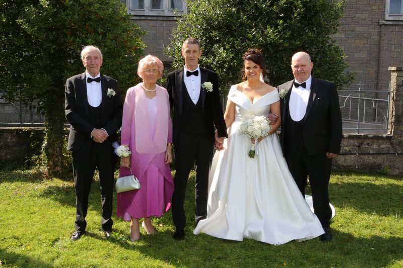 Majella and Brian with their parents.