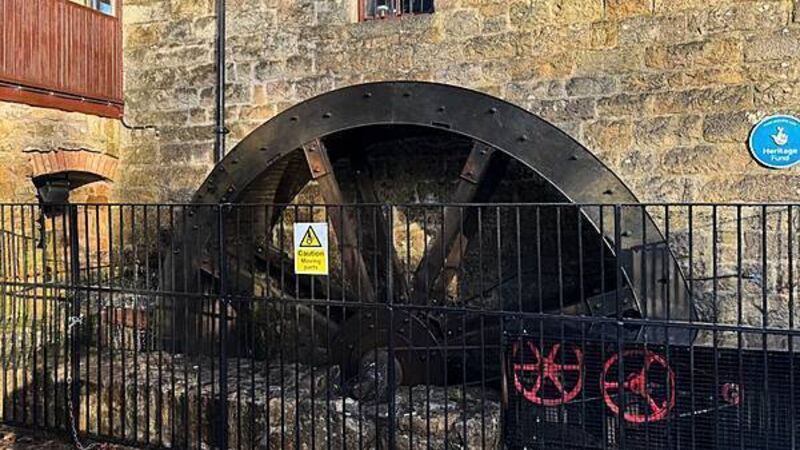 Water wheel starts turning again to power restaurant at historic mill