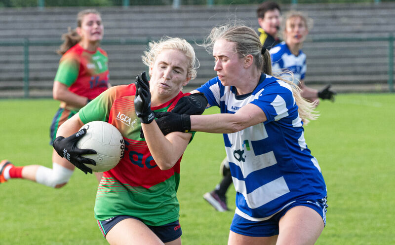 Clonakilty's Meabh O'Donovan holds off the challenge from Kinsale's Dara Tyner. Picture: Howard Crowdy Clonakilty's Meabh O'Donovan holds off the challenge from Kinsale's Dara Tyner. Picture: Howard Crowdy