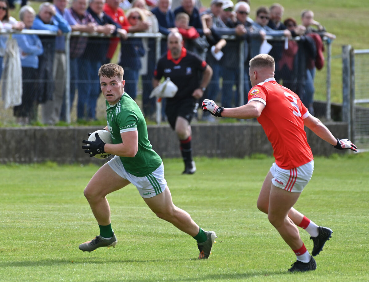  Fionn Herlihy, Dohenys, has his path blocked by Darren Daly, O'Donovan Rossa. Picture: Dan Linehan