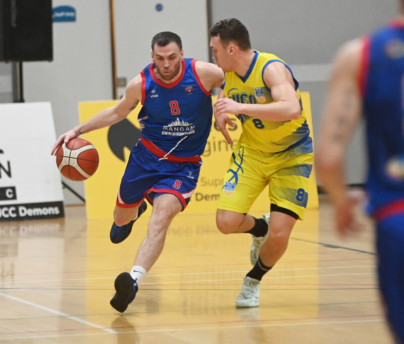 UCC Demons' Kyle Hosford takes on UCD Marian's Lovre Tyrdic. Picture: Eddie O'Hare