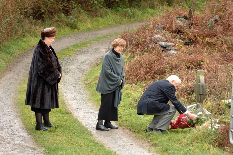 Marguerite Bouniol, Georges Bouniol and Madeline Opelka laying a wreath at the scene of Sophie Toscan du Plantier's murder in Toormore, West Cork